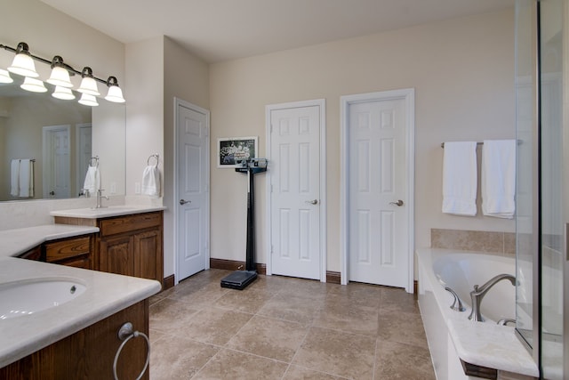 6001 Lacebark Elm Dr, Fort Worth, TX 76123 - full bath with vanity and a garden tub