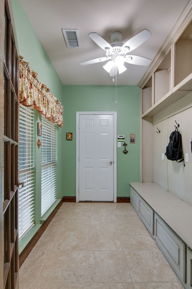 6001 Lacebark Elm Dr, Fort Worth, TX 76123 - mudroom with a ceiling fan, light tile patterned floors, and baseboards