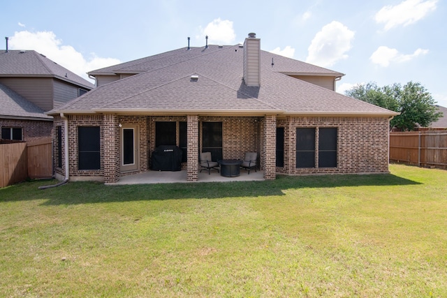 6001 Lacebark Elm Dr, Fort Worth, TX 76123 - back of house with a patio, a chimney, roof with shingles, and brick siding