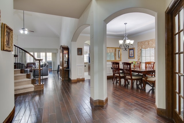 6001 Lacebark Elm Dr, Fort Worth, TX 76123 - entryway with arched walkways, dark wood-style floors, plenty of natural light, and ornamental molding