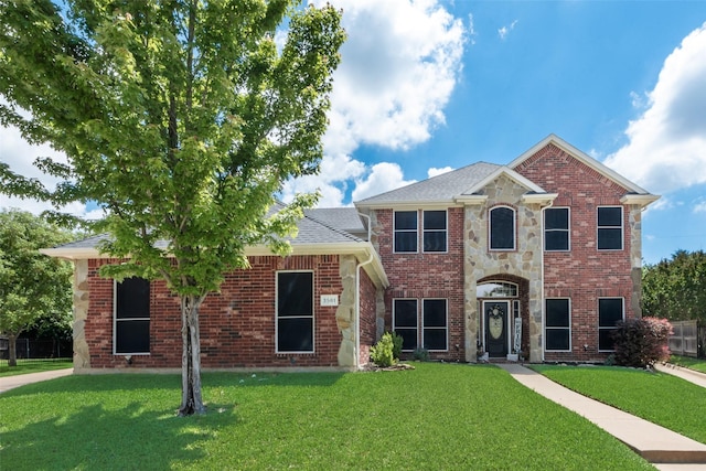 3501 Kasmier Ct, Arlington, TX 76001 - view of front facade featuring a front lawn and brick siding