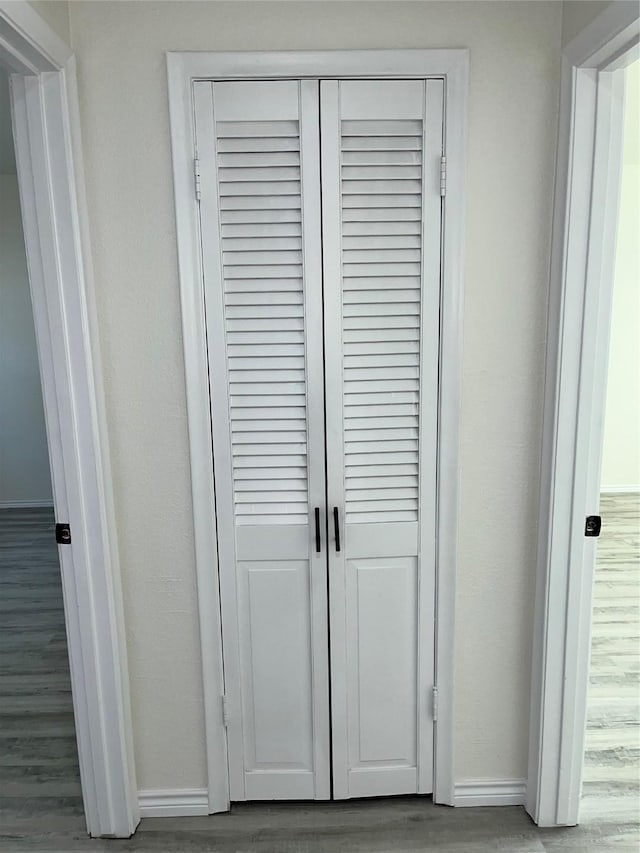 6706 Frontage Rd, Greenville, TX 75402 - detailed view of baseboards and wood finished floors