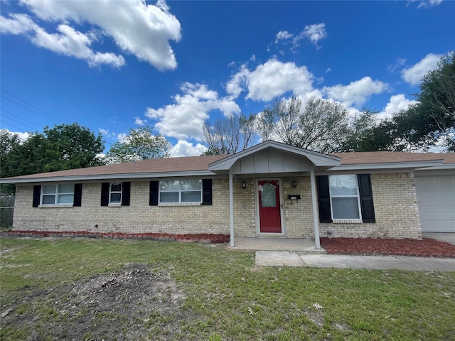 6706 Frontage Rd, Greenville, TX 75402 - ranch-style house with brick siding, a garage, and a front lawn