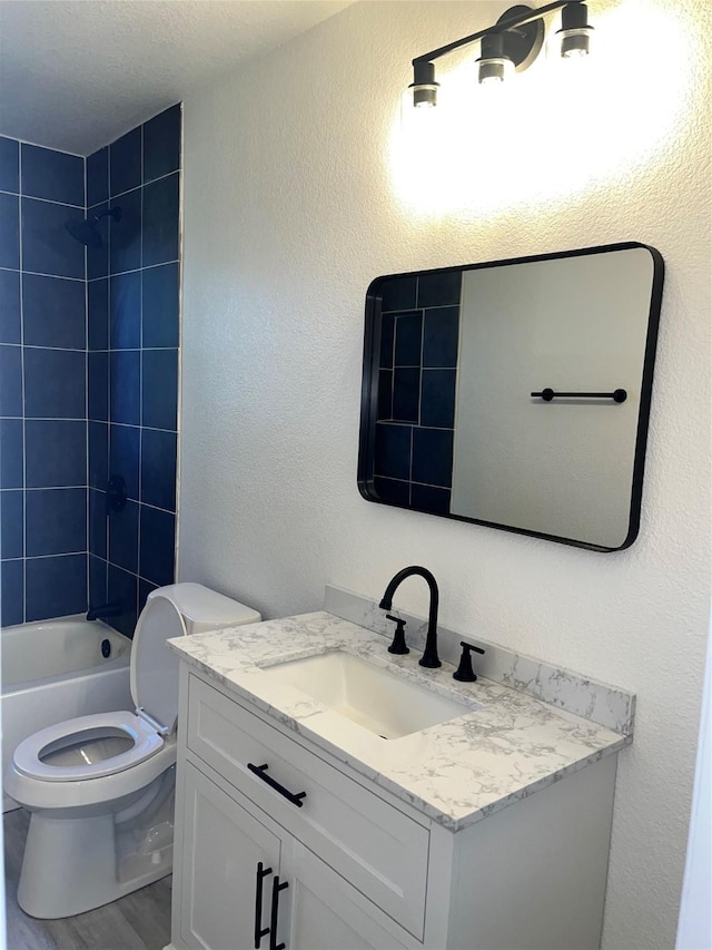 6706 Frontage Rd, Greenville, TX 75402 - full bath with vanity, toilet, and shower / washtub combination
