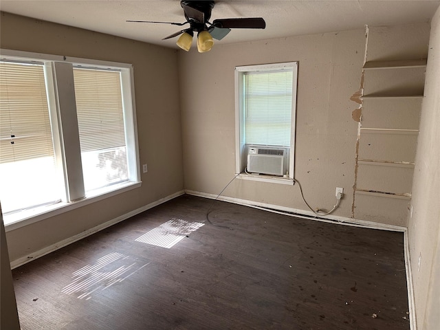 201 N Mount St, Chico, TX 76431 - spare room featuring healthy amount of natural light, wood finished floors, a ceiling fan, and baseboards