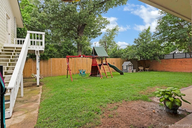 4320 Richmond Ave, Shreveport, LA 71106 - view of yard featuring a playground and stairs