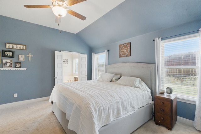 711 Red Stone Ln, Weatherford, TX 76087 - bedroom featuring light carpet, baseboards, vaulted ceiling, and ceiling fan