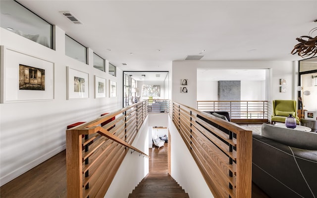 11460 Strait Ln, Dallas, TX 75229 - stairway featuring wood finished floors and baseboards