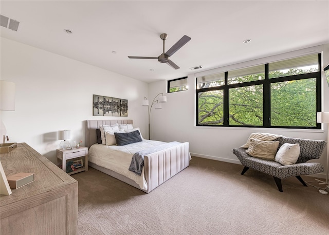 11460 Strait Ln, Dallas, TX 75229 - carpeted bedroom with ceiling fan and baseboards