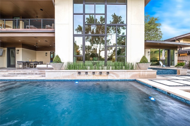 11460 Strait Ln, Dallas, TX 75229 - swimming pool featuring a patio and outdoor dining area