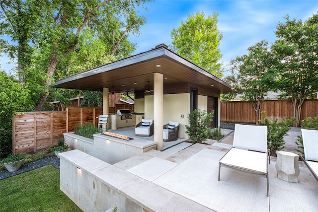 11460 Strait Ln, Dallas, TX 75229 - view of patio / terrace with an outdoor kitchen, a fenced backyard, a grill, and ceiling fan
