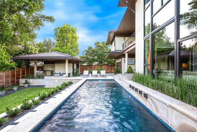 11460 Strait Ln, Dallas, TX 75229 - view of swimming pool with a patio area