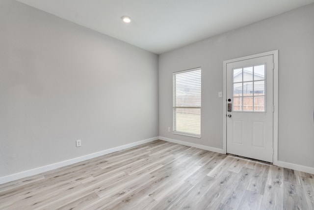 4007 Freedom St, Heartland, TX 75126 - entryway with light wood-type flooring, baseboards, and recessed lighting