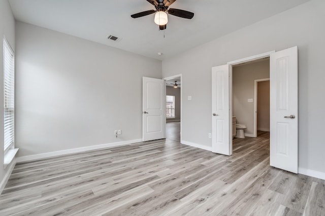 4007 Freedom St, Heartland, TX 75126 - unfurnished bedroom featuring light wood finished floors, baseboards, and ceiling fan