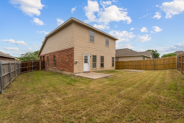 4007 Freedom St, Heartland, TX 75126 - back of house featuring a patio and brick siding