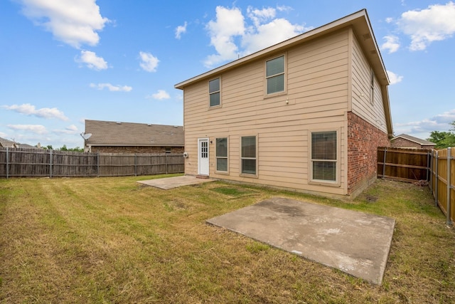4007 Freedom St, Heartland, TX 75126 - back of house featuring a patio and brick siding