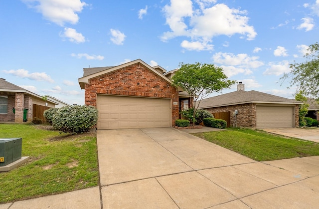 4007 Freedom St, Heartland, TX 75126 - view of front of property featuring brick siding, a front lawn, and concrete driveway