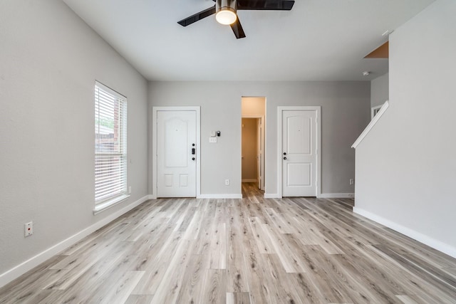 4007 Freedom St, Heartland, TX 75126 - entryway with a ceiling fan, baseboards, and light wood-style flooring