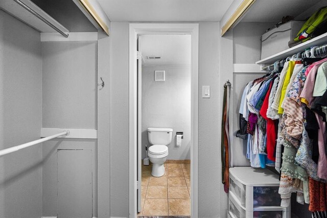 4571 N O Connor Rd Unit 1323, Irving, TX 75062 - walk in closet featuring light tile patterned floors