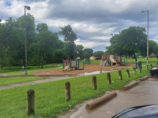 6341 Leaning Oak St, Dallas, TX 75241 - community jungle gym featuring a yard
