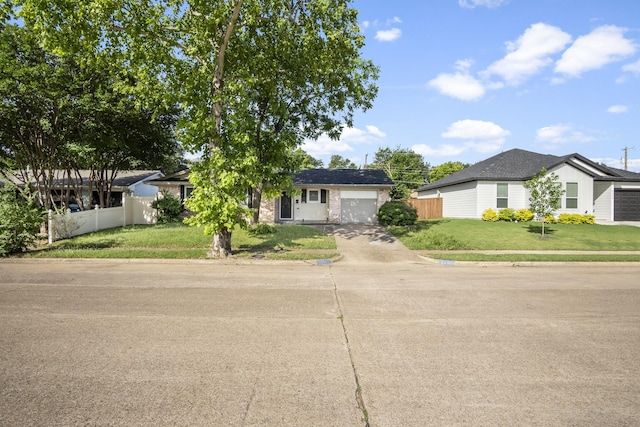6341 Leaning Oaks St, Dallas, TX 75241 - view of front of house featuring concrete driveway and an attached garage