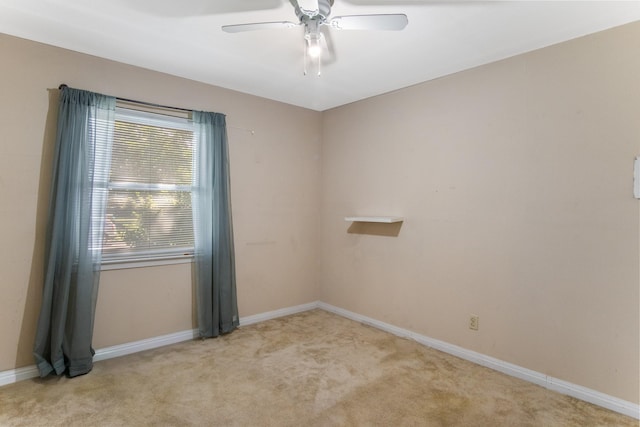 6341 Leaning Oaks St, Dallas, TX 75241 - spare room featuring light colored carpet, ceiling fan, and baseboards