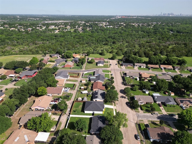 6341 Leaning Oaks St, Dallas, TX 75241 - aerial overview of property's location featuring nearby suburban area and a forest