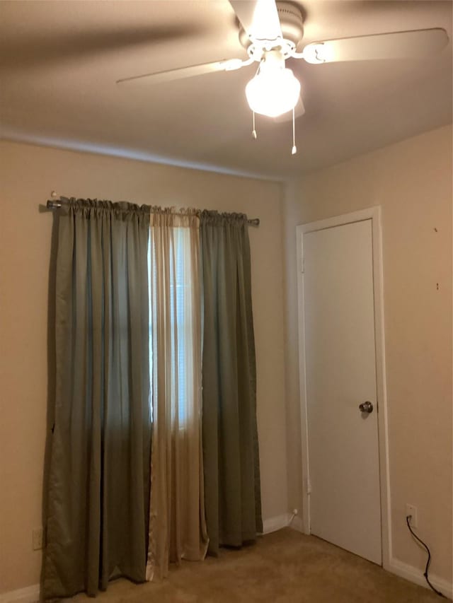 6341 Leaning Oak St, Dallas, TX 75241 - unfurnished room with light carpet, ceiling fan, and baseboards