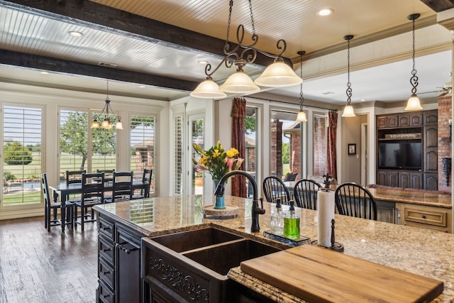 3060 Anna Cade Cir, Rockwall, TX 75087 - kitchen featuring a sink, wood finished floors, decorative light fixtures, a chandelier, and beamed ceiling
