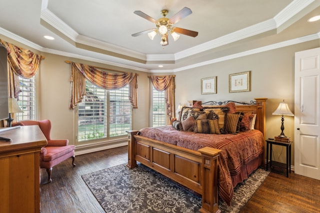 3060 Anna Cade Cir, Rockwall, TX 75087 - bedroom with a tray ceiling, multiple windows, crown molding, dark wood-style flooring, and recessed lighting