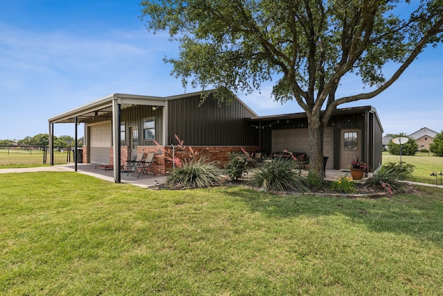3060 Anna Cade Cir, Rockwall, TX 75087 - view of front of house with board and batten siding, brick siding, and a garage