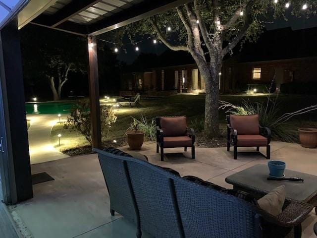 3060 Anna Cade Cir, Rockwall, TX 75087 - patio at twilight with a patio area and an outdoor pool