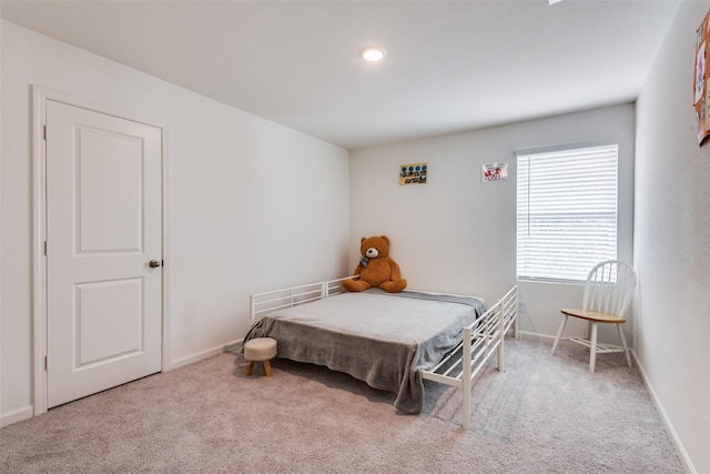 2115 Revere Dr, Princeton, TX 75407 - carpeted bedroom with baseboards