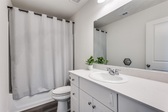 2115 Revere Dr, Princeton, TX 75407 - full bath with vanity, toilet, and wood finished floors