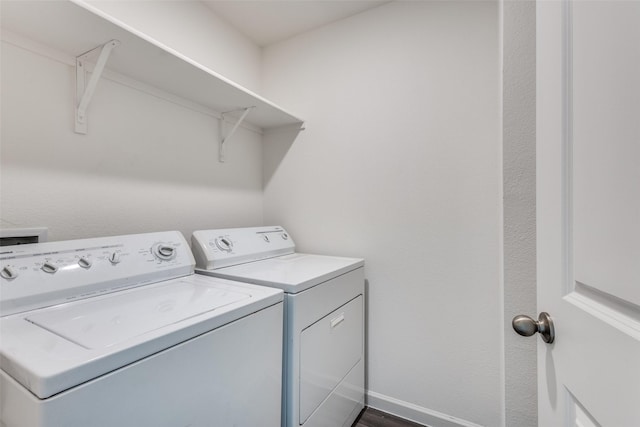 2115 Revere Dr, Princeton, TX 75407 - laundry room with washing machine and clothes dryer and baseboards