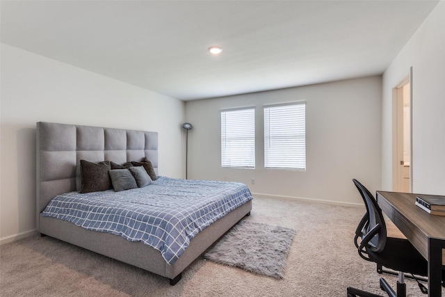 2115 Revere Dr, Princeton, TX 75407 - carpeted bedroom with baseboards and a desk
