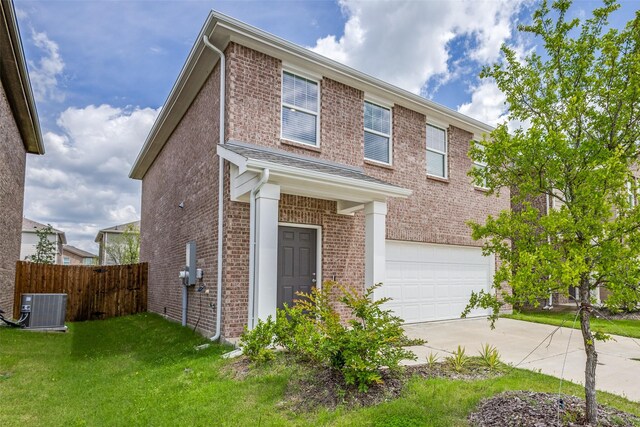 2115 Revere Dr, Princeton, TX 75407 - traditional home featuring an attached garage, concrete driveway, cooling unit, and brick siding