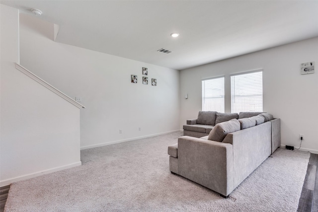 2115 Revere Dr, Princeton, TX 75407 - living area featuring baseboards, carpet, and recessed lighting