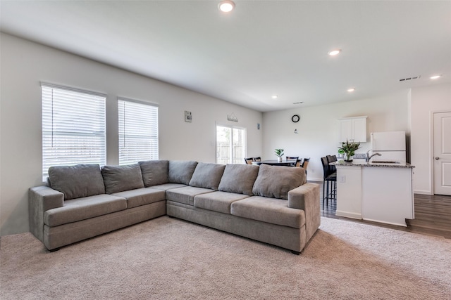 2115 Revere Dr, Princeton, TX 75407 - living room with recessed lighting and wood finished floors