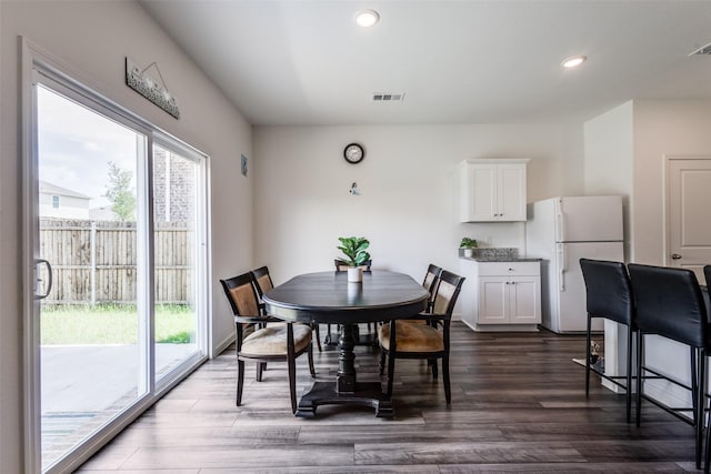 2115 Revere Dr, Princeton, TX 75407 - dining room featuring healthy amount of natural light, recessed lighting, and dark wood-type flooring
