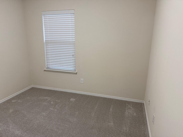 7421 Kite Ln, Frisco, TX 75036 - carpeted empty room featuring baseboards