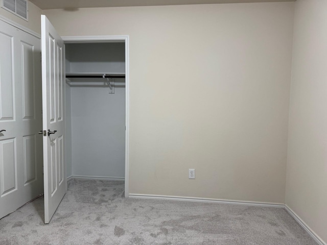 7421 Kite Ln, Frisco, TX 75036 - unfurnished bedroom featuring light colored carpet, a closet, and baseboards