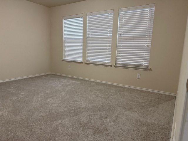 7421 Kite Ln, Frisco, TX 75036 - empty room featuring carpet flooring and baseboards