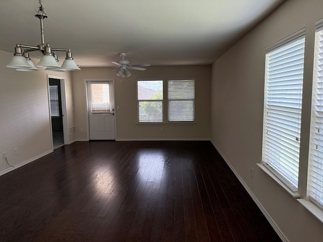 7421 Kite Ln, Frisco, TX 75036 - unfurnished living room with ceiling fan, baseboards, and dark wood-type flooring