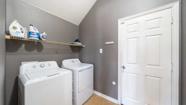 109 Harvest Way, Crandall, TX 75114 - washroom featuring separate washer and dryer, light tile patterned floors, and baseboards