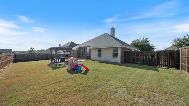 109 Harvest Way, Crandall, TX 75114 - back of property featuring a pergola, a chimney, a shingled roof, and a patio