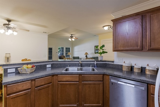 819 Earhart Ave, Grand Prairie, TX 75051 - kitchen featuring dishwasher, a sink, ceiling fan, dark countertops, and a peninsula
