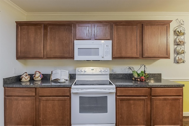 819 Earhart Ave, Grand Prairie, TX 75051 - kitchen featuring white appliances, dark countertops, and ornamental molding