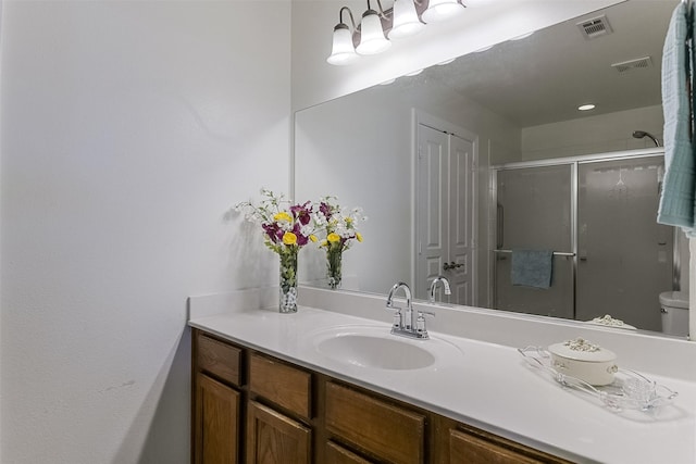 819 Earhart Ave, Grand Prairie, TX 75051 - full bath featuring vanity, a shower stall, and toilet