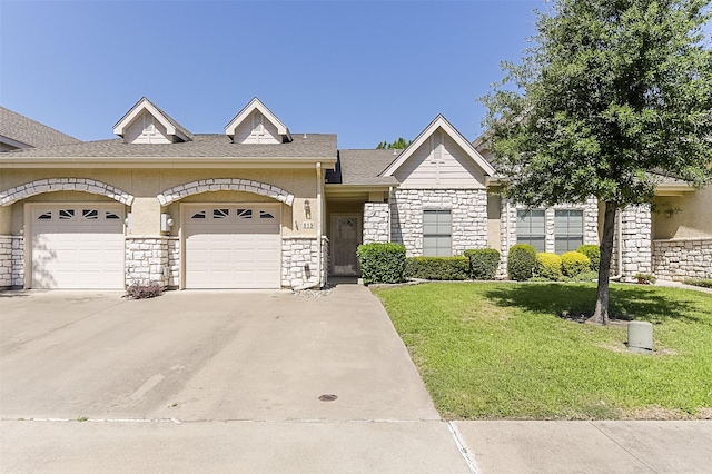819 Earhart Ave, Grand Prairie, TX 75051 - view of front of home featuring driveway, a front yard, a garage, stone siding, and a shingled roof